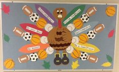 a bulletin board with a turkey on it's head and sports balls in the background