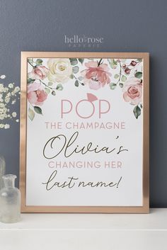 a sign that says pop the champagne she's changing her last name