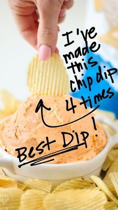 a hand dipping a chip into a bowl of chips with the words, i've made this chip dip 4 times best dip