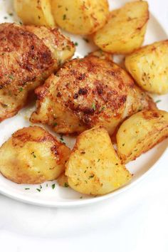 some cooked potatoes on a white plate