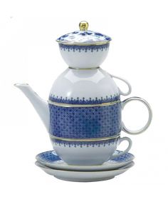 Blue Lace Tea for Two is a gift that will delight a couple or a person who just loves a small pot of tea. It is designed to stack and be put on a shelf. It is a fine starter china gift for weddings. The teapot set is shipped in a white presentation box that will protect the porcelain during shipping and tied with a signature Mottahedeh blue ribbon.The delicate teardrop border was inspired by Ch’ing Dynasty (1644 - 1911) porcelain from China and is highlighted by bands of 22 karat gold. Tea Balls, Fine Dinnerware, Plate Dessert, Tea Kettles, Butter Plate, Tea For One, Candle Holder Decor, Linen Paper, Bread Butter