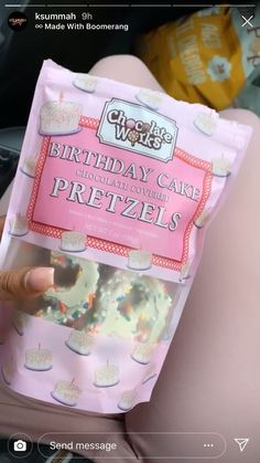 someone is holding up a birthday cake pretzels bag