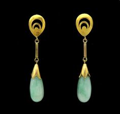 - Presented is a lovely pair of vintage 14 karat yellow gold and jade earrings. Each earring features a beautiful mottled green jade drop connected to a yellow gold teardrop shape with stylish crescent shaped openwork decoration. The earrings have post style backs suitable for wear with pierced ears.  The earrings are in excellent condition. The jade drops are securely set and in great shape.   The earrings are stamped and guaranteed 14k on the backs. All parts are nitric acid tested and guarant Yellow Gold Jade Earrings, Teardrop Jade Earrings For Formal Occasions, Formal Yellow Gold Jade Earrings, Mixed Metal Bracelets, Large Statement Earrings, Gold Pin, Jade Earrings, Jade Jewelry, Jade Stone