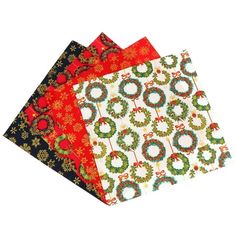 four pieces of fabric with christmas wreaths on them