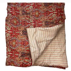 an image of a red and brown paisley print bedding set with matching pillow cases