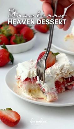 someone is cutting into a dessert on a plate with strawberries in the bowl behind it