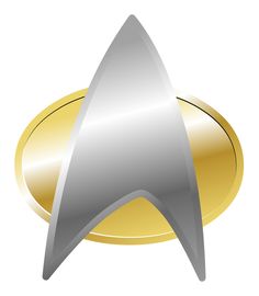 a silver and gold star trek emblem