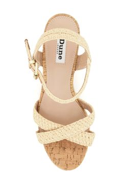 Woven straps and a cork wedge give beach-ready style to this sandal. 3 1/2" heel Adjustable ankle strap with buckle closure; hidden elastic inset Synthetic upper, lining and sole Imported Cork Open Toe Wedge Sandals For Beach, Open Toe Cork Wedge Sandals For Beach, Open Toe Cork Wedge Sandals With Heel Strap, Cork Wedge Heel Sandals For Vacation, Cork Wedge Sandals For Vacation, Cork Wedge Sandals With Heel Strap, Cork Sandals With Heel Strap And Wedge Heel, Cork Wedge Sandals With Removable Insole And Ankle Strap, Cork Wedge Heel Sandals For Summer