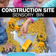 two children playing with construction site toys in a plastic container and text overlay reads construction site sensory bin