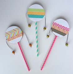 three handmade lollipops with different patterns on them