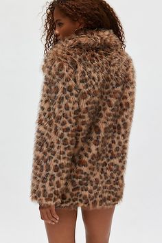 Silence + Noise coat in an allover cheetah faux fur we’re wild for. Designed in an oversized jacket fit featuring an exaggerated collar neckline, hand pockets and a button up front. Only at Urban Outfitters. Features Silence + Noise Stacey cheetah faux fur overcoat Animal print jacket Cheetah print faux fur Oversized collar neckline and long sleeves Button-up jacket with front pockets Boxy, oversized fit Longline length Lined Button closure UO exclusive Content + Care 100% Polyester; lining 100% polyester Machine wash Imported Size + Fit Model in Brown is 5’11" and wearing size Small Measurements taken from size Medium Length: 27" | Silence + Noise Stacey Cheetah Faux Fur Overcoat Jacket in Brown, Women's at Urban Outfitters Fall Leopard Print Fur Coat With Faux Fur Lining, Leopard Print Outerwear With Faux Fur Trim, Fall Leopard Print Faux Fur Coat, Leopard Print Fur Coat With Faux Fur Trim, Winter Leopard Print Faux Fur Outerwear, Winter Leopard Print Outerwear With Faux Fur Trim, Fall Leopard Print Outerwear With Faux Fur Trim, Exaggerated Collar, Overcoat Jacket