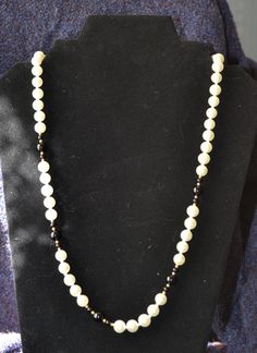 Vintage black and white pearl necklace with hinged clasp.  12 inch in length and designed as a high-end fashion accessory in the 1950s. Classic Black Beaded Necklaces, Classic Black Pearl Drop Necklace, Black And White Pearl Necklace, Beaded Jewelry Necklaces, Vintage Black And White, White Pearl Necklace, Art Deco Necklace, Beaded Necklaces, High End Fashion