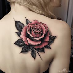 a woman with a rose tattoo on her back