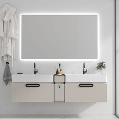 a bathroom vanity with two sinks and a large mirror above it, in front of a white wall