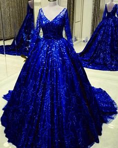 Long Sleeve Ball Gown For Quinceanera And Prom Season, Elegant Long Sleeve Ball Gown For Quinceanera, Fitted Long Sleeve Ball Gown For Quinceanera, Long Sleeve Prom Ball Gown With Sweep Train, Glamorous Long Sleeve Ball Gown For Prom Season, Glamorous Long Sleeve Ball Gown For Prom, Quinceanera Ball Gown With Sweep Train For Party, Long Sleeve Gown For Debutante Ball, Glamorous Long Sleeve Party Ball Gown