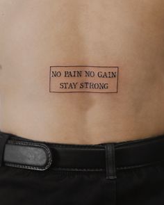 “Embrace resilience: ‘No Pain No Gain, Stay Strong’ inked as a testament to perseverance.” Tattoo Back Tattoo, Tattoo Back, No Pain No Gain, Tattoo Tattoo