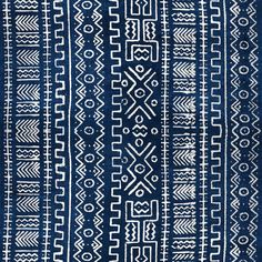 a blue and white rug with an intricate design on the front, side, and back