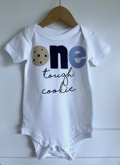 a baby romper with the words one touch cookie printed on it's chest