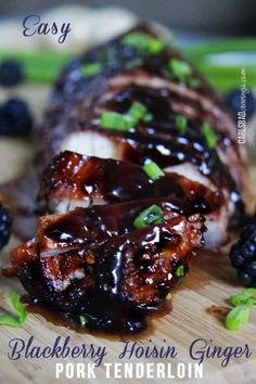 the pork tenderloin has blackberries on it