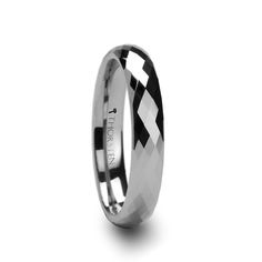 a wedding ring with black and white diamonds on the inside, in stainless steel or gold