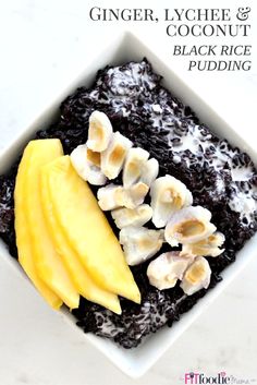 a white bowl filled with food on top of a marble countertop next to a banana