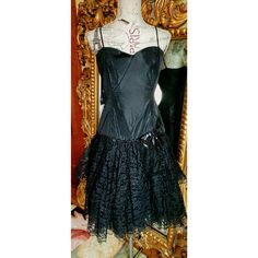 This fabulous party dress is from the 80's by Loralie.  Iconic 80s style.  The bodice is made of black taffeta with a drop waist style.  Layers of lace and tulle make up the skirt. Black sequin bow applique decorate one side of the hip.  There is sequin lace trim above the lace tier.  Center back zip and spaghetti straps.  Excellent condition.  Best fit would be a Medium, however, please see the measurements below for a proper fit.  All sales are final. Measurements Armpit-armpit doubled 36" Waist 28" Hip measured along the sequin trim 36" Length 40" Style Layers, Bow Applique, Lace Party Dress, Girls Just Wanna Have Fun, Lace Party Dresses, Sequin Bow, 80s Style, Wiggle Dress, Dress Girls