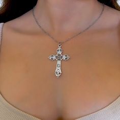 Gift your Catholic friend a stunning religious jewelry piece with this vintage silver cross necklace, perfect for women seeking dark elegance with a touch of silver cross jewelry   𝐃𝐄𝐓𝐀𝐈𝐋𝐒:  ⭐️ Necklace lengths available: 14" 16" 18" 20" ⭐️ Pendant size is 2" ⭐️ The silver cross charm is silver plated over alloy. The chain necklace is made up of stainless steel ⭐️The cutest statement piece, The Celine cross necklace  ⭐️ ALL jewelry include 1 year warranty only for broken or discolored pie Silver Cross Necklace With Clavicle Chain, Vintage Nickel-free Cross Necklace, Clavicle Chain Cross Necklace, Vintage Cross Necklace As Gift, Silver Spiritual Cross Necklace With Clavicle Chain, Elegant Nickel Free Crucifix Necklace, Elegant Nickel-free Cross Pendant Necklace, Elegant Nickel-free Silver Cross Necklace, Elegant Silver Nickel-free Cross Necklace