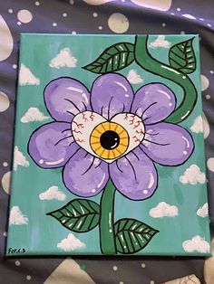 a painting of a purple flower on a blue background with white clouds and green leaves