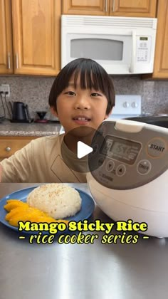 a little boy sitting in front of a rice cooker with food on the plate