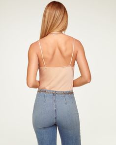 Calling all cami lovers - Abigail was made for you. Frame your figure in this classic top, crafted in the best of satin charmeuse in a rainbow of colors sure to spark joy. Pair with your favorite high waisted denim and a statement necklace and watch this elevated classic take center stage. Size & Fit – This style runs small, we suggest sizing up. – Model is Wearing Size XS– Model is 5'9" Size Guide Details & Care – Dry Clean or Hand Wash– Style #: A0221116 Free Delivery & Easy Returns We offer f Trendy Satin Cami Top, Satin Tank Top With Adjustable Straps For Night Out, Satin Tops With Adjustable Straps, Satin Top With Adjustable Straps, Cowl Neck Tank Top, Ramy Brook, Spark Joy, Center Stage, High Waisted Denim