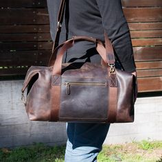 "Overnight leather bag, men leather overnight, leather overnight bag mens, leather overnight bag man, leather travel bag Great leather travel bag for men. Very spacious, nice looking. You can take it on a plane as cabin luggage.  Excellent craftsmanship, amazing quality, and the perfect size make the backpack your favorite bag ever. These leather duffels are completely handmade with great care. Every knick, wrinkle and scratch is unique to the leather and adds to its character.  You will absolut Large Leather Travel Bag Ideal As Gift, Leather Travel Bag As A Gift, Classic Leather Travel Bag As Gift, Leather Travel Bag With Luggage Sleeve As Gift, Rectangular Duffle Bag With Luggage Sleeve As Gift, Large Capacity Tote Weekender Bag As Gift, Luxury Rectangular Travel Bag For Gift, Luxury Rectangular Travel Bag As Gift, Luxury Rectangular Travel Bag Gift