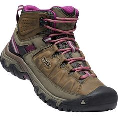 a women's hiking boot with pink laces