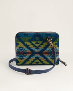 Stay organized with this wallet-on-a-strap in Pendleton's exclusive USA wool. Multiple slots and an ID window will keep you organized, while RFID protection helps keep everything secure. Pattern placement may vary.    6½"W x 5½"H x 1½"W  53½" removable strap  100% pure virgin wool with cotton trim  Wool fabric woven in our American mills Pendleton Blanket, Towels Kids, Wool Shirt, Buying Diamonds, Luggage Accessories, Shop Mens Clothing, Pet Gift, Top Gifts, Stay Organized