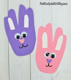 two bunny and rabbit hand puppets on a white wooden background with text overlay that says, easter crafts for kids