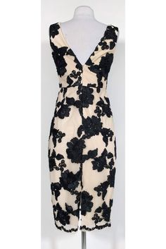 Slip this fun dress on for a daytime wedding or garden party and you'll be the talk of the town! Gorgeous ribbon applique in a floral print decorate the lovely and lightweight mesh. Size 2 100% Nylon Ribbon 100% polyester Lining 100% polyester Fully lined V-neck front and back Concealed zipper Bust 30" Waist 26" Hip 32" Shoulder to hem 42" Cream Floral Applique Dress For Summer, Summer Cream Dress With Floral Applique, Cream Dress With Floral Applique For Summer, Floral Applique Dress For Formal Summer Events, Summer Formal Dresses With Floral Applique, Formal Summer Dress With Floral Applique, Cream Floral Embellished Summer Dress, Cream Floral Applique Dress For Party, Cream Dress With Floral Applique For Party