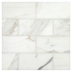 a white marble tile wall that looks like it has been cleaned