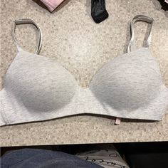 Wireless Bra. 34d. Heathered Grey. Never Worn But Washed. Fitted Nursing Bra For Loungewear, Nursing Bra For Loungewear, Padded Cups Bra For Loungewear, Fitted Padded Bra For Loungewear, Victoria's Secret Gray Bra, Stretch Padded Cup Bra For Loungewear, Stretch Bra With Padded Cups For Loungewear, Fitted Gray Bra With Medium Bust Support, Stretch Padded Bra For Loungewear