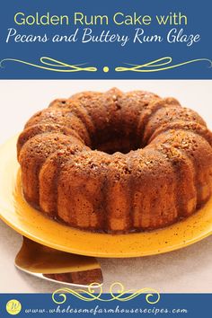 a bundt cake with pecans and buttery rum glaze on a yellow plate