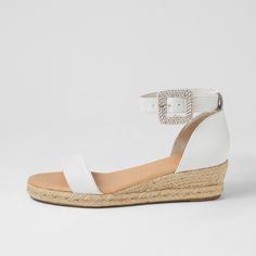 Step out in style with these white open-toe espadrille sandals. Featuring a buckle ankle strap and comfortable wedge heels, they are perfect for both casual and dressy occasions. Color: White Heel Type: Wedge heel Heel height: 2.1" / 53 mm approx Product measurements were taken using size 8. Please note that measurements may vary by size. Toe: Open toe Woven buckled ankle strap Handcrafted US sizing. Fits true to size. White Espadrille Wedge Sandals For Spring, White Espadrille Sandals For Summer, White Casual Wedge Sandals With Buckle Closure, White Espadrilles With Removable Insole For Summer, White Platform Espadrille Wedge Sandals, White Espadrille Heels For Vacation, White Espadrille Heels For Summer, Chic White Espadrille Heels, Summer Espadrille Wedge Sandals With Buckle Closure