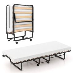 a bed frame with two mattresses attached to it and another one on the ground