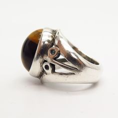 925 Sterling Silver Vintage Real Tiger Eye Gemstone Ring Size 4 Weight: 15.0g WELCOME TO PAWN SHOP We are an actual pawn shop and have been in business for over 25 years. Since 1990, our establishment has been serving a variety of clients by providing them with short term cash solutions and options of liquidity regarding their treasured heirlooms. Acknowledging that today′s customers are very sophisticated and are looking for a variety of investments, our acquisitions are hand-picked for our spe Real Tiger, Tiger Eye Gemstone, Real Turquoise, Tigers Eye Gemstone, Pawn Shop, Thumb Rings, Turquoise Gemstone, Hand Picked, Gemstone Ring