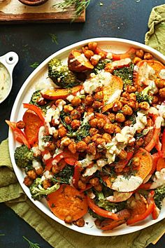 a white plate topped with lots of vegetables