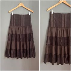 Hello, There! I'm Ira and I'm glad to meet you 🤗 Vintage Armand Thiery tiered skirt. I like this chocolate brown😌 Brand: Armand Thiery Composition: 60% cotton, 35% polyamide, 5% elastane. Lining - 100% polyester Condition: nice preloved condition, no flaws Size: 38, better fits size S-M Waist: 35 cm / 13.8 inches Hips: 47 cm / 18.5 inches Length: 78 cm / 30.7 inches Comes from a pet and smoke free place. SHIPPING I will ship by "UkrPost" Registered Airmail. The items are shipped 1-2 business d Brown Tiered Lined Skirt, Brown Ruffled Skirt, Brown Flora Midi Ruffle Tiered Skirt, Brown Ruffled Tiered Mini Skirt, Vintage Brown Tiered Skirt, Zipper Skirt, Tier Skirt, Chocolate Brown, Side Zipper