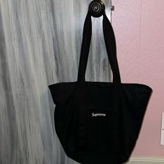 Used This Many Times For School. Fits Quite Literally Anything. It’s In Perfect Condition. I Purchased It Last Year At The Supreme Store. Black Canvas Bags With Large Capacity, Black Canvas Satchel Bag, Black Canvas Satchel With Removable Pouch, Black Canvas Satchel For Shopping, Black Satchel Canvas Bag For On-the-go, Black Canvas Bag With Adjustable Strap For Shopping, Black Canvas Satchel For On-the-go, Black Canvas Bag With Double Handle, Black Canvas Satchel With Handles