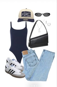 a woman is wearing a blue bodysuit, jeans and adidas sneakers while holding a black purse