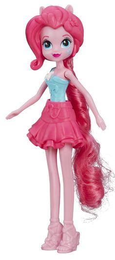 a pink doll with long hair wearing a dress and shoes, standing in front of a white background