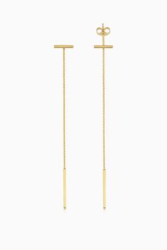 A long vertical line dropping from a short horizontal bar, creates the stunning linear visual that is our Tea Time Drop Earrings. Sure to be a quick favorite, they are light and easy to wear, at tea time, a night out and pretty much everywhere in between. Metal: 14k Yellow Gold Weight: 1.2 Grams Crafted in San Zeno, Vicenza, Italy 14k Gold Long Drop Linear Earrings, Modern Yellow Gold Long Drop Threader Earrings, Minimalist Yellow Gold Linear Long Drop Earrings, Minimalist Yellow Gold Long Drop Earrings, Modern Long Drop Yellow Gold Linear Earrings, Vicenza Italy, Gold Tea, Tea Time, Night Out