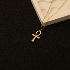 Discover the timeless elegance of our 14K gold-plated ankh cross necklace ✨,a symbol of life and strength. Perfect as a birthday or summer gift for your loved one. This exquisitely crafted piece combines the Key Of Life pendant with the mystical charm of the Egyptian cross ☥. A gift that promises protection and a meaningful connection." Discover our collection today  and find your perfect  necklace that you'll treasure foreve 🌟 Product Specifications 🌟 🔹 Material: Sterling Silver, 14k Gold Fi Spiritual Ankh Cross Necklace Gift, Gold Ankh Jewelry For Gifts, Gold Ankh Necklace Gift, Gold Ankh Necklace For Gift, Ankh-shaped Yellow Gold Necklace For Gift, Gold Ankh Cross Necklace Gift, Spiritual Ankh Necklace For Gift, Egyptian Cross, Key Of Life