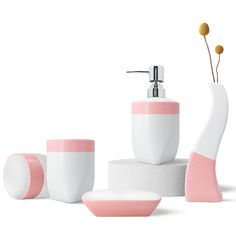 a bathroom set with soap dispenser, toothbrush holder and other items