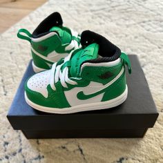 Brand New, Never Worn. Toddler Nike Jordan 1 Mid High Top Shoe. Sold Out. Lucky Green/Black/White. Size 5c. In Excellent Brand New Condition. High Top Jordans, Nike Jordan 1 Mid, Nike Jordan 1, High Top Shoe, Toddler Nikes, Lucky Green, Jordan 1 Mid, Kids Nike, Nike Jordan